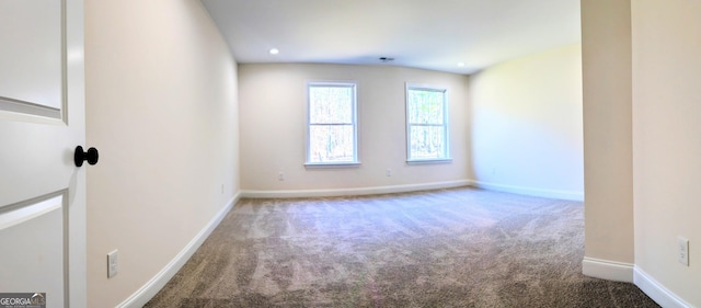 empty room with carpet floors