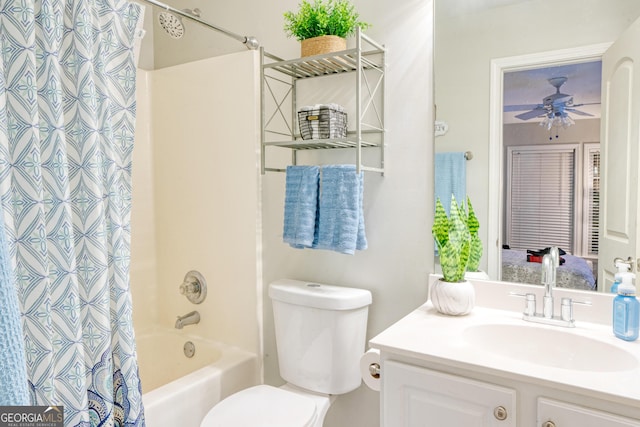 full bathroom with vanity, ceiling fan, toilet, and shower / tub combo