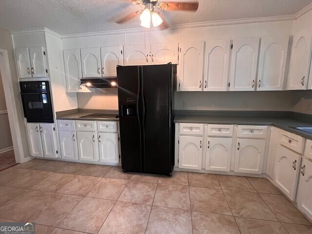 kitchen featuring white cabinets, a textured ceiling, and black appliances