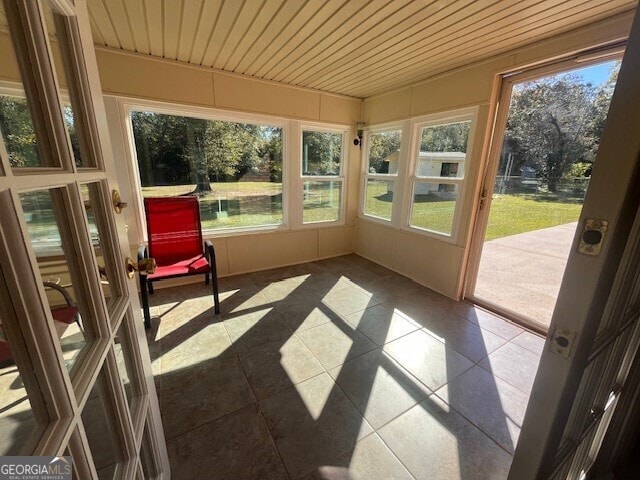 sunroom / solarium with wooden ceiling