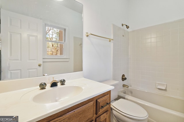 full bathroom with bathing tub / shower combination, toilet, and vanity