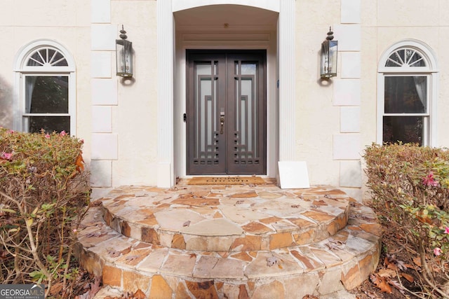 entrance to property with french doors