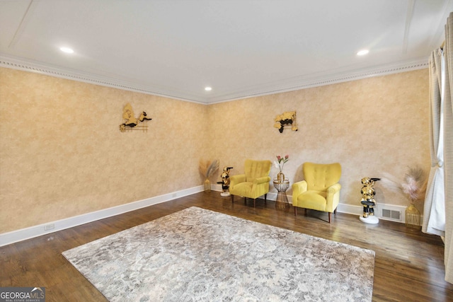 unfurnished room featuring dark hardwood / wood-style flooring and ornamental molding