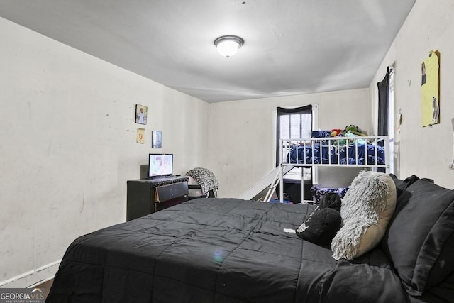 bedroom featuring baseboard heating