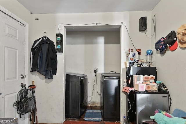 laundry room with washer and clothes dryer