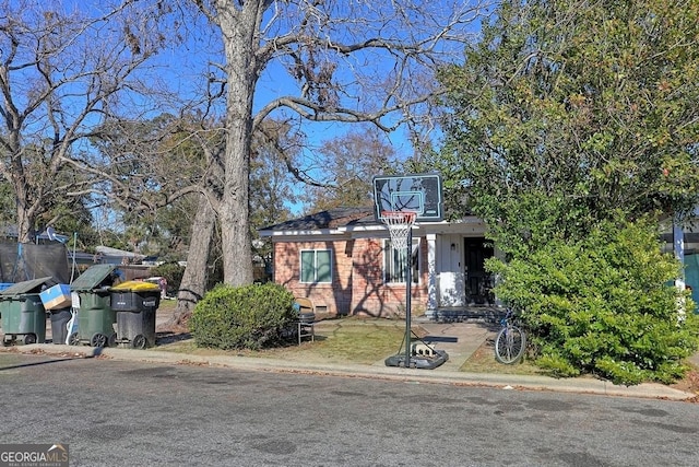 view of front of home with a trampoline