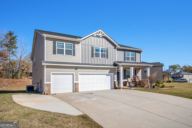 view of front of home featuring a front lawn and a garage