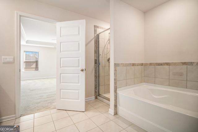 bathroom with tile patterned flooring and plus walk in shower