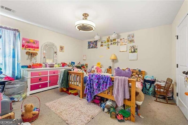 bedroom featuring carpet