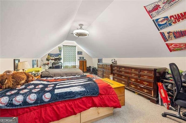 carpeted bedroom with vaulted ceiling