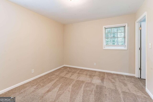 view of carpeted spare room