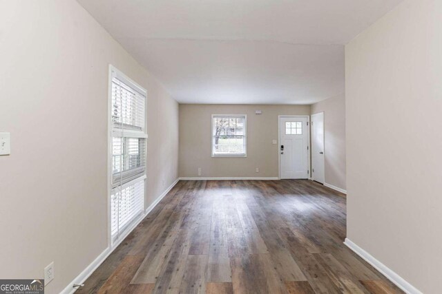 interior space featuring dark wood-type flooring