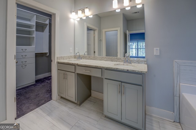 bathroom featuring vanity