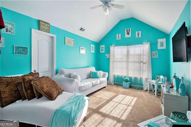 interior space with light colored carpet, ceiling fan, and lofted ceiling