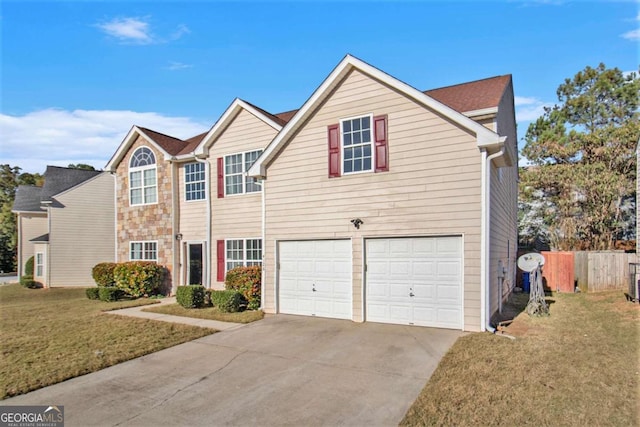 view of front facade with a front lawn and a garage