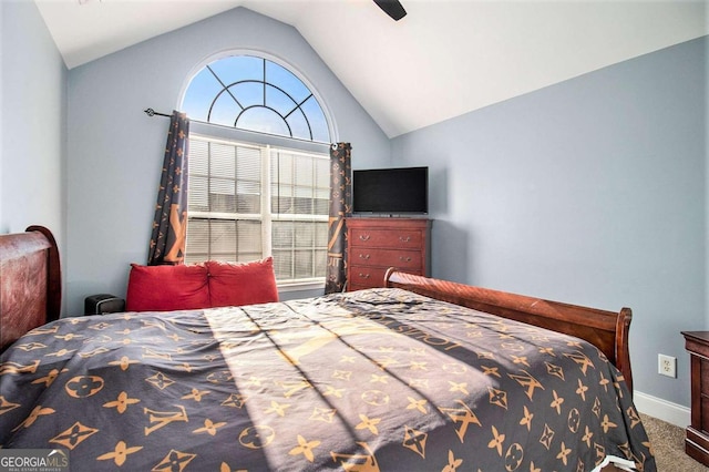 bedroom featuring carpet floors and vaulted ceiling