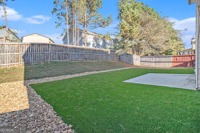 view of yard with a patio area