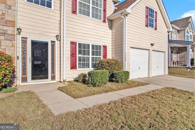 view of side of home with a garage