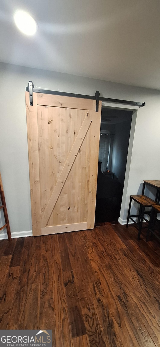 washroom featuring electric panel, cabinets, dark hardwood / wood-style floors, and independent washer and dryer