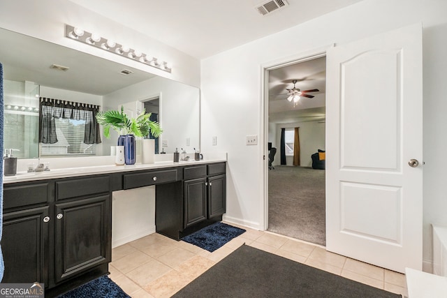 bathroom with ceiling fan, tile patterned flooring, vanity, and plenty of natural light