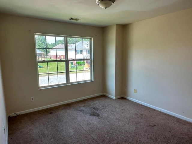 view of carpeted spare room