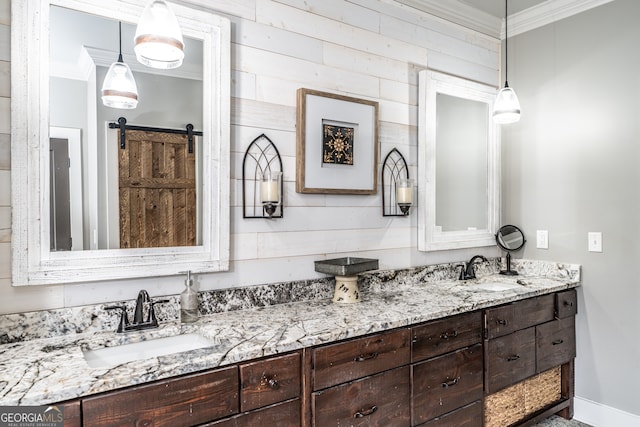 bathroom with vanity and crown molding