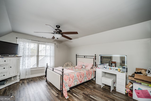 bedroom with dark hardwood / wood-style floors, ceiling fan, and lofted ceiling