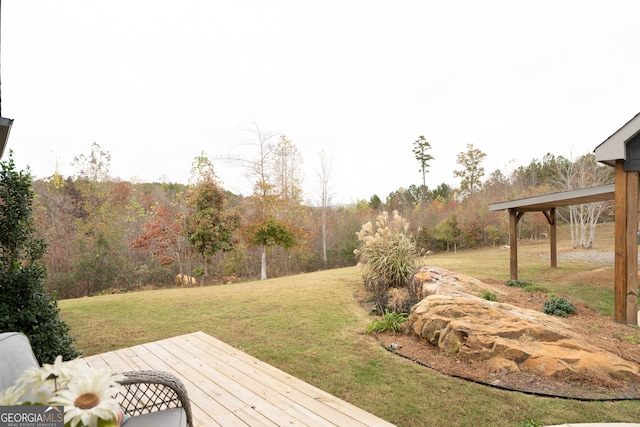 view of yard with a deck