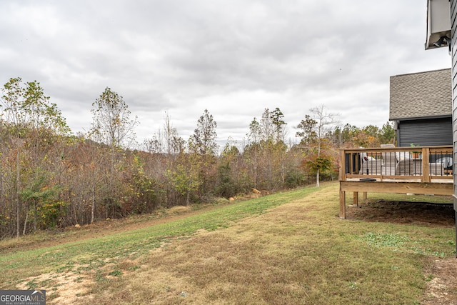 view of yard with a deck