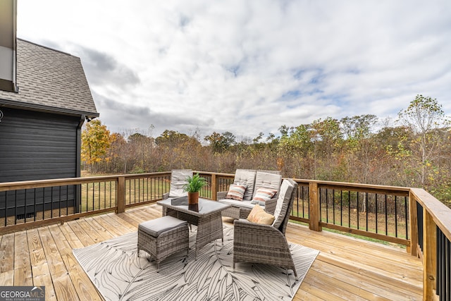 wooden deck featuring outdoor lounge area