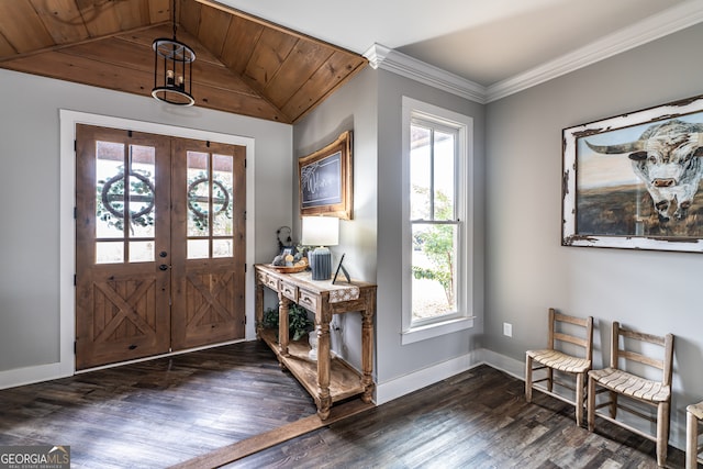 entrance foyer featuring french doors, dark wood-type flooring, wooden ceiling, vaulted ceiling, and ornamental molding