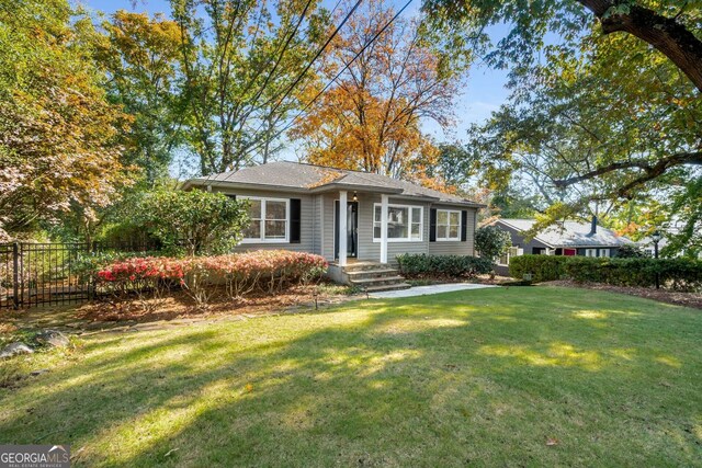 view of front of home with a front yard