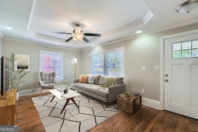 living room featuring a healthy amount of sunlight and hardwood / wood-style flooring