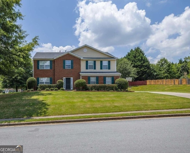 view of front of property featuring a front lawn