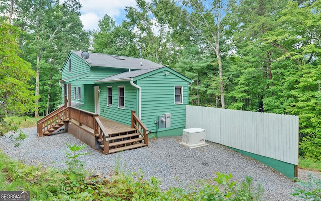 rear view of house with a deck