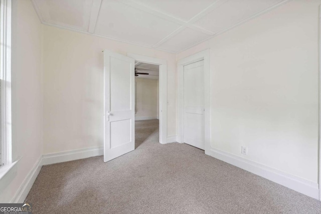 empty room with light colored carpet