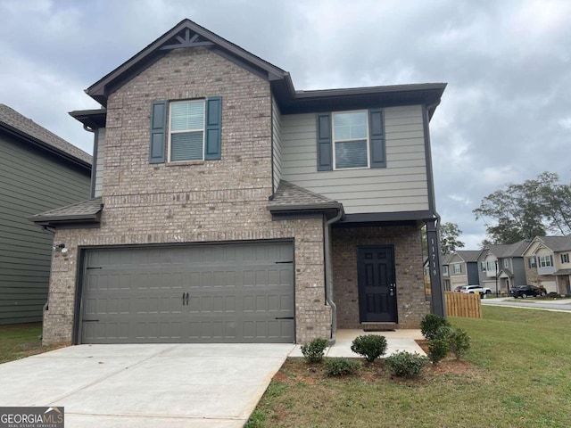 view of front property with a garage and a front lawn