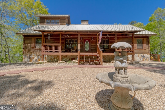 739 Barnes Mill Rd, Hamilton, GA 31811 - view of front of property with a porch, metal roof, a chimney, and a ceiling fan