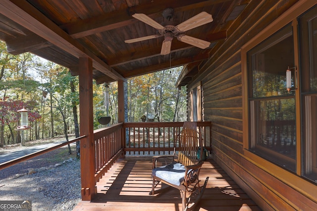 deck featuring ceiling fan and a porch