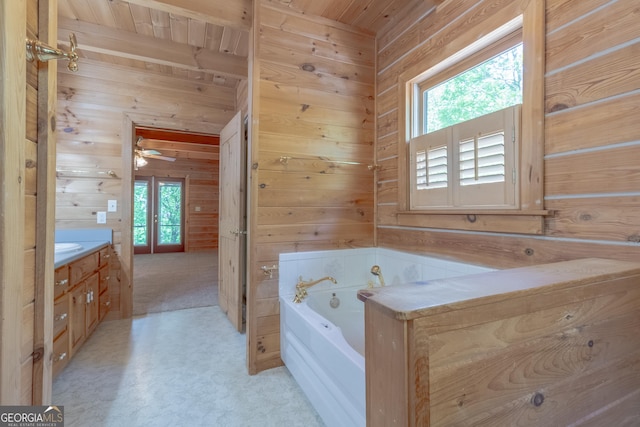 739 Barnes Mill Rd, Hamilton, GA 31811 - full bathroom with wood ceiling, a garden tub, wooden walls, and vanity