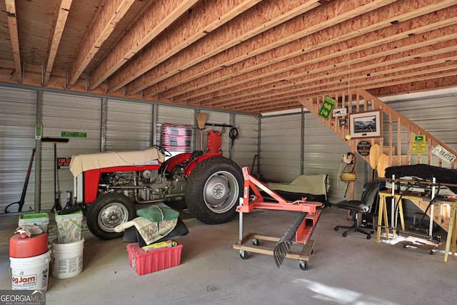 garage featuring a carport