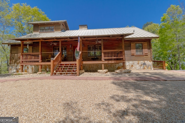 739 Barnes Mill Rd, Hamilton, GA 31811 - log home with ceiling fan, covered porch, metal roof, and a chimney