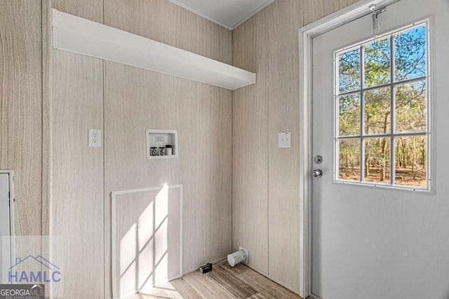 washroom with washer hookup and light hardwood / wood-style floors