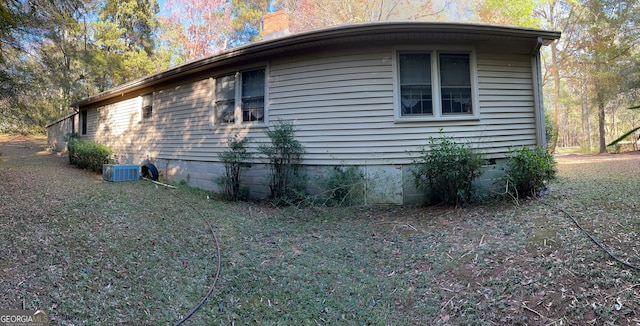 view of property exterior featuring central AC