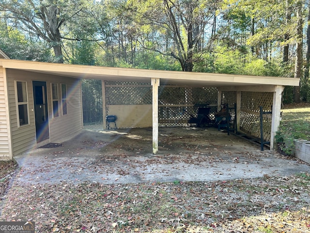 view of parking / parking lot with a carport