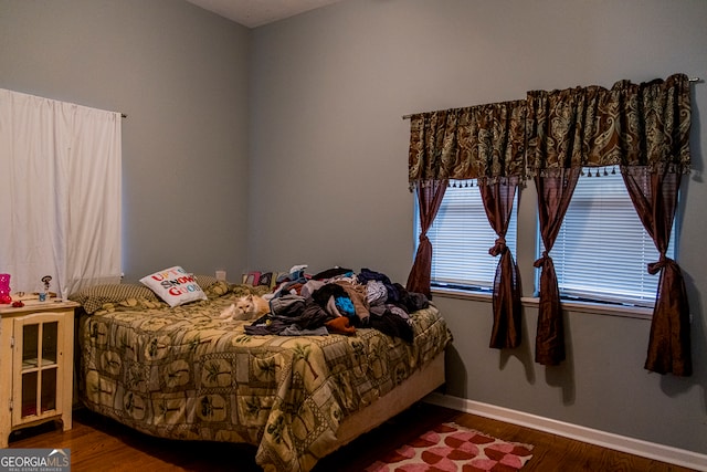 bedroom featuring hardwood / wood-style flooring