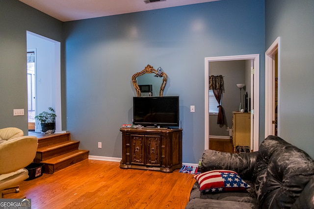 living room with light hardwood / wood-style flooring