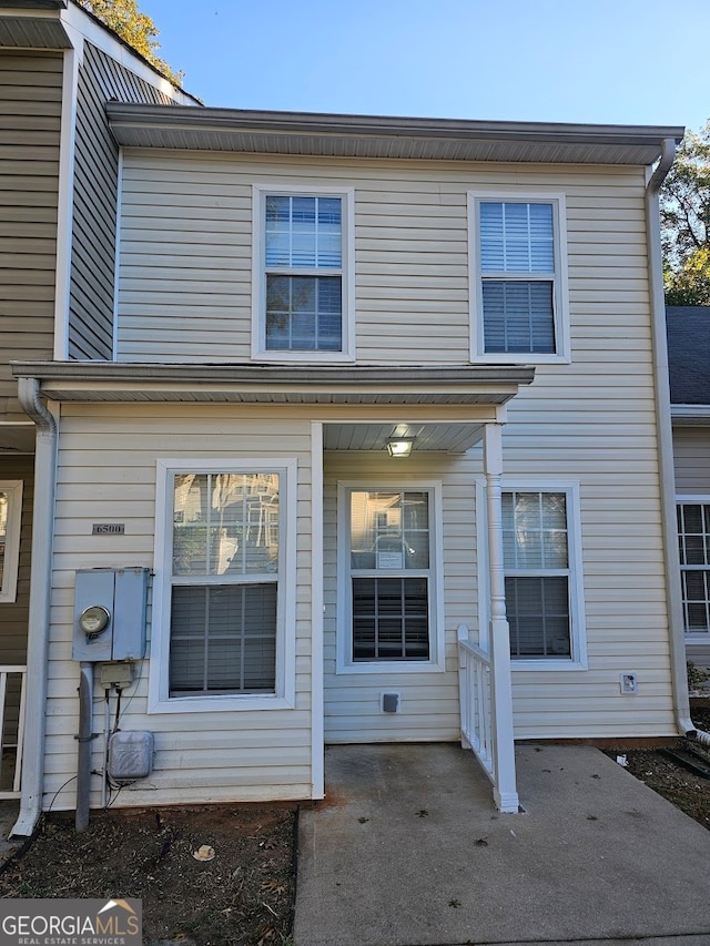 view of front facade with a patio area