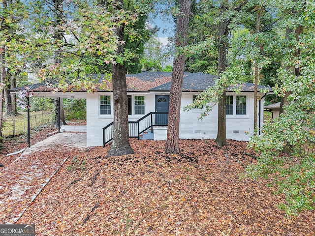 exterior space featuring a carport