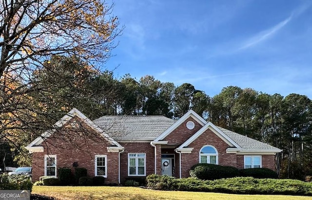 view of front of home with a front yard